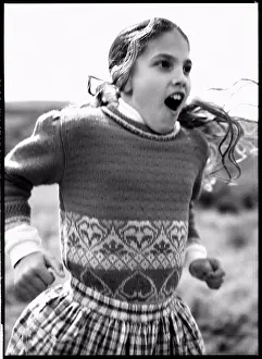 Verticals Prints: Discover- A girl is jumping with joy