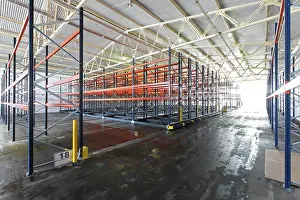 Metall Prints: Distribution warehouse Mobile roller shelving system in distribution warehouse