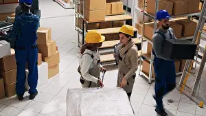 Logistics Prints: Diverse women talking about shipment and delivery