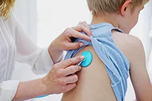 Examination Prints: Doctor auscultating a child