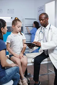 Examination Prints: Doctor explaining treatment to patient