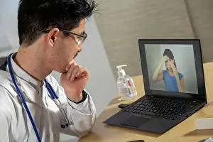Woman Patient Prints: Doctor in remote consultation with 30 year old female patient with sinus pain