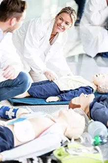Practise Prints: Doctors undertaking CPR training