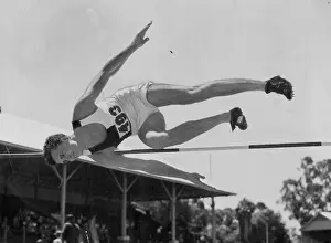 Game Prints: Doug Stuart, the athlete, coming out of his Western roll after clearing the bar at 6ft 6¼in at Leaderville (WA)
