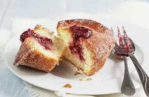 Halved Prints: A doughnut muffin with raspberry jam, sliced