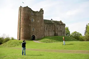 Model Release Prints: Doune, Scotland. Young Travelers enjoying the beautiful scenery around Scotlands Doune Castle