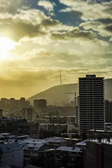 Besichtigung Prints: Dramatic sky over Tbilisi city Dramatic sky over Tbilisi citys downtown in winter with sun rays and snow Copyright