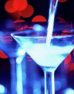 Glass Material Prints: Dry martini cocktail being poured