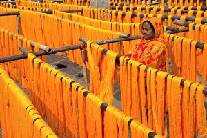 Weaving Prints: Drying dyed yarn in the traditional weaving village