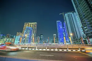 Staedtisch Prints: Dubai Marina night skyline from the bridge