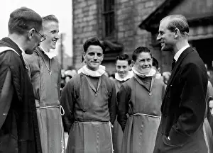Royal Prints: The Duke At Canongate Kirk. The Duke chatting to choir boys at the Canongate Kirk