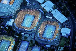 Tennis Prints: Dusk aerial view of the Australian Open Tennis tournament. At Rod Laver Arena