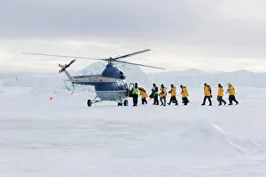 Tours Prints: Eco-tourists boarding helicopter