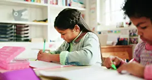 Stationery Prints: Education, students and child writing in classroom for learning