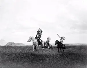 Archival Indians Prints: Edward S. Curits Native American Indians - Three Sioux Indians on horseback on plains with rock formations