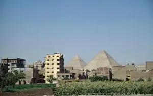 Archaeology Prints: Egypt, Cairo, City Suburbs Encroaching On The Pyramids At Giza