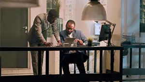 Paperwork Prints: Employee helps coworker solve tasks