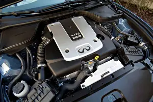 2012 Prints: Engine view of a 2012 Infiniti G37 Convertible showing the 3.7 liter V6 VVEL engine