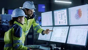 Electronics Prints: Engineers in factory control room