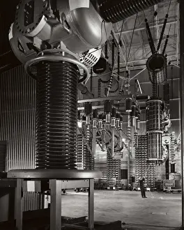 Effort Prints: Two engineers working with tuning reactors