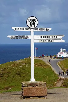 Cafe Prints: England, Cornwall, Lands End. Lands End milepost with the First and Last house in the background