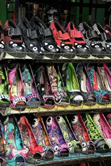 Colourful Prints: England, London, Camden Town. Brightly coloured ladies shoes on a market stall