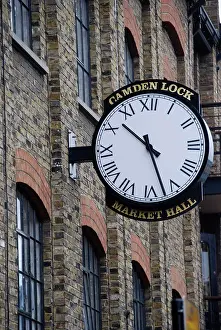 Trades Prints: England, London, Camden Town. A clock on the exterior of the Market Hall building at Camden Lock Market