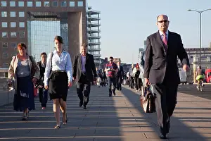 Financial Prints: England, London, Early morning commuters crossing London Bridge towards the City Financial district