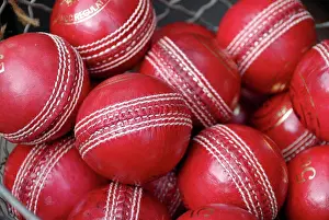 Capital Prints: England, London, Portobello Road. A basket full of old red cricket balls