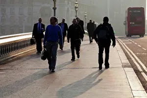 Westminster Prints: England, London, Westminster. Commuters on Westminster Bridge at sunrise