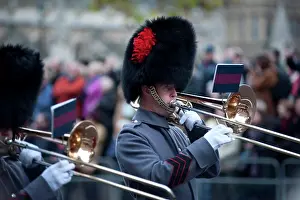 Brass Prints: England, London, Whitehall. Military band marches through Whitehall as part of the Remembrance Day Parade