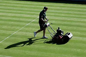 Oldest Prints: England, London, Wimbledon. The grass is cut on the outside courts during the Wimbledon Tennis Championships 2008