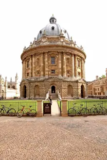 Students Prints: England, Oxfordshire, Oxford. Bicycles chained to the fence encircling the Radcliffe Camera building