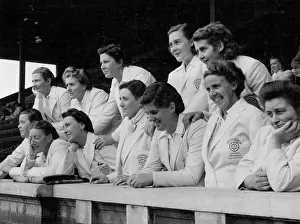 1949 Prints: English Women Crickets watched anxiously from the grandstand at the South Melbourne Cricket Ground as rain fell early