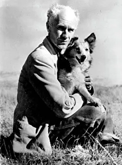 1945 Prints: Ernie Pyle And His Dog -- Ernie Pyle