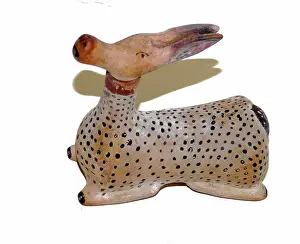 Deer Prints: Etruscan scent bottle in the shape of a female deer. Dated 550 BC