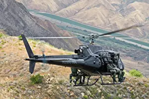 Afternoon Prints: Eurocopter AS350 Ecureuil A-Star Helicopter flying over the hills of Malibu