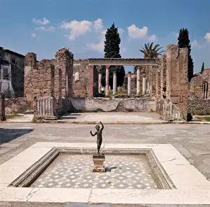 Traveller Prints: Europe, Italy, Pompeii. The remains of the House of the Faun include geometric mosaics in the foreground at Pompeii