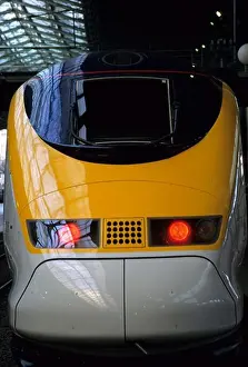 Trains Prints: Eurostar high speed train yellow gray red lights train station street
