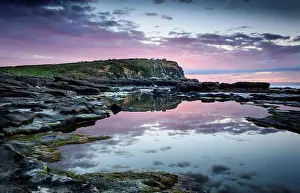 Evening Light Prints: Evening mood at the sea, rocky coast, Curio Bay, The Catlins, South Island, New Zealand