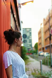 Denim Prints: Expressive playful girl posing on red