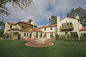 First Class Prints: Exterior of a SPANISH STYLE LUXURY HOME with stucco walls and red tile roof