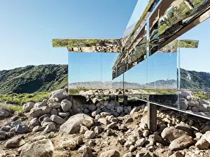 General View Prints: Exterior view of east facade, showing the landscape being reflected in the mirror clad facade