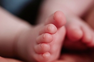 Limb Prints: Extreme close-up of baby girl's feet