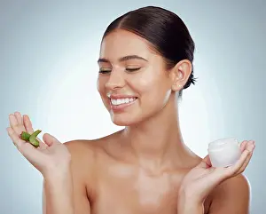 Healing Prints: Face cream, aloe vera or woman with smile for beauty on white background with herbs