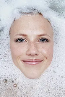 Unwind Prints: Face of woman in the bath