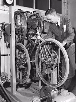 Bicycle Prints: Factory in the 1950s. A worker at bicycle and motorcycle company Monark in Sweden