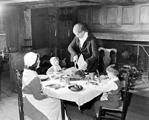Cutting Prints: Family at a dining table on Thanksgiving Day