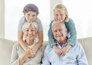 Grandma Prints: Family, grandparents and children in home portrait