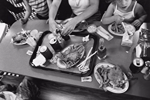 Culinary Prints: Family having junk food meal